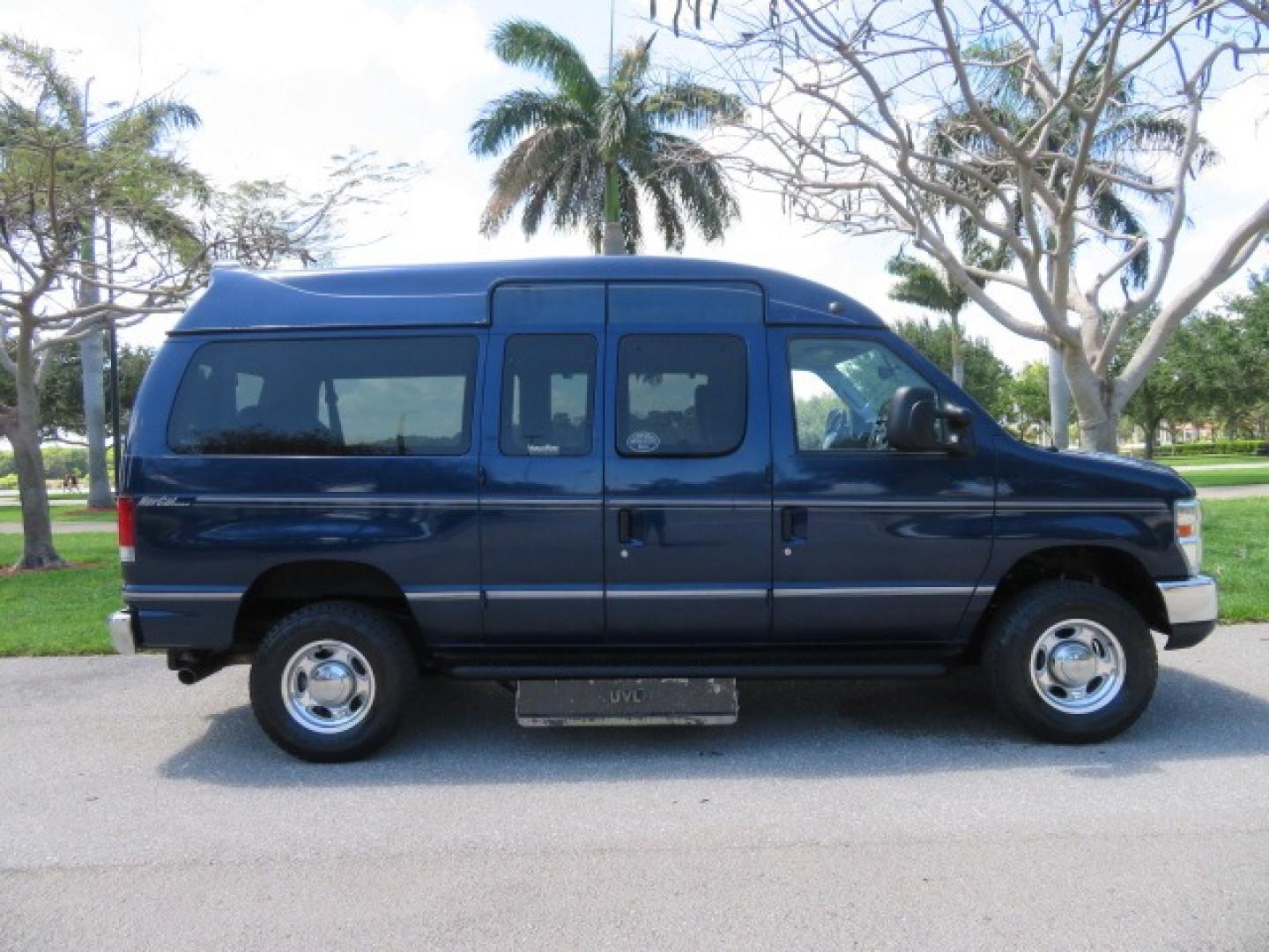 2011 Dark Blue /Gray Ford E-Series Wagon E-350 XLT Super Duty (1FBNE3BS4BD) with an 6.8L V10 SOHC 20V engine, located at 4301 Oak Circle #19, Boca Raton, FL, 33431, (954) 561-2499, 26.388861, -80.084038 - You are looking at a Gorgeous 2011 Ford Econoline E350 XLT Norcal Max High Top Handicap Wheelchair Conversion Van with 6.8L V10, 15K Original Miles, 9 Inch Lowered Floor, Braun UVL Side Entry Wheelchair Lift, Remote Control Power Side Entry Doors, Expanded Side Entry Doors, Q Straint Tie Down, Syste - Photo#6